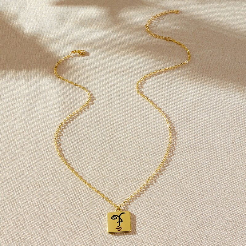 

Abstract Face Pendant Necklace, Gold