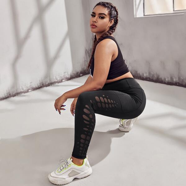 

Plus Laser Cut Out Sports Leggings With Phone Pocket, Black