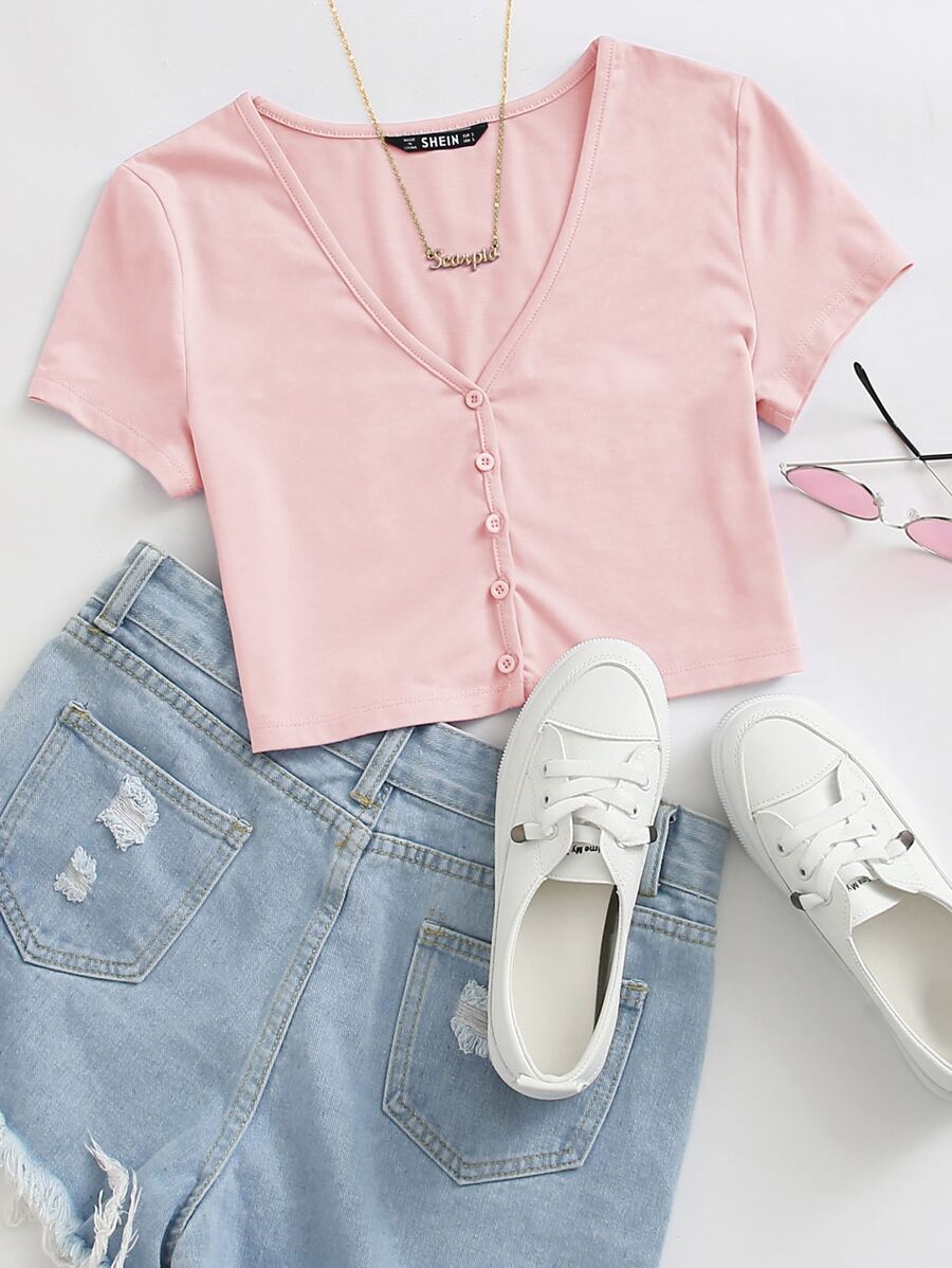 Muchica Top corto con botón delantero