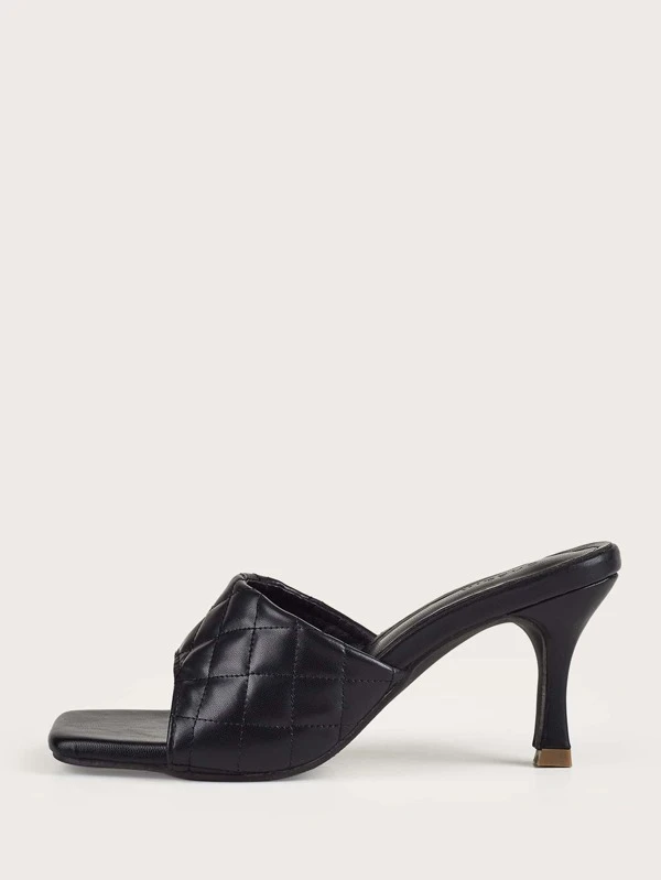 black heeled mules uk