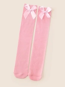 小女童蝴蝶結裝飾及膝襪