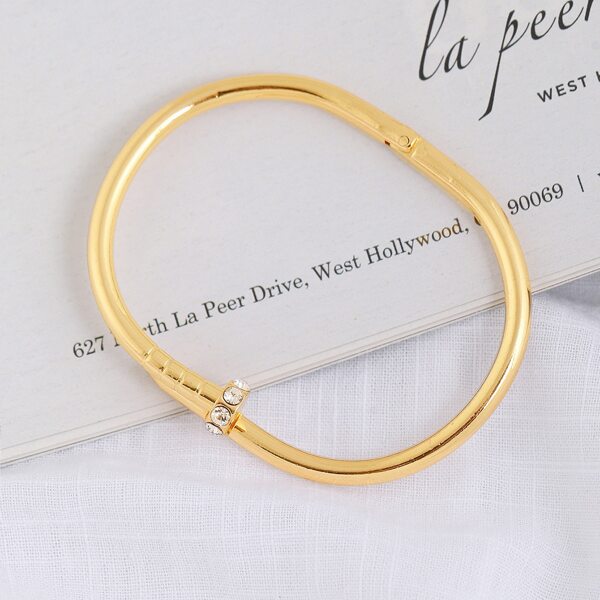 

Rhinestone Embellished Gold Bracelet