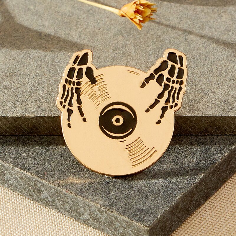

Hand & CD Round Brooch, Gold