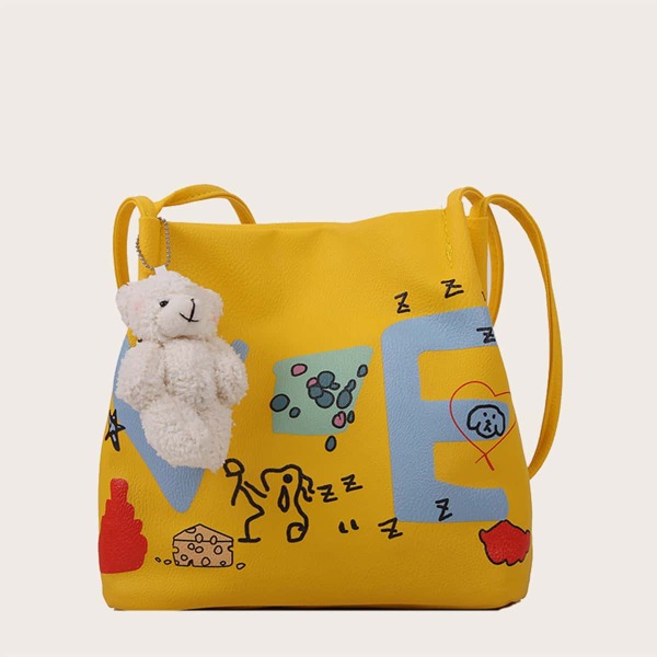 

Girls Cartoon Graphic Shoulder Bag With Bag Charm, Yellow