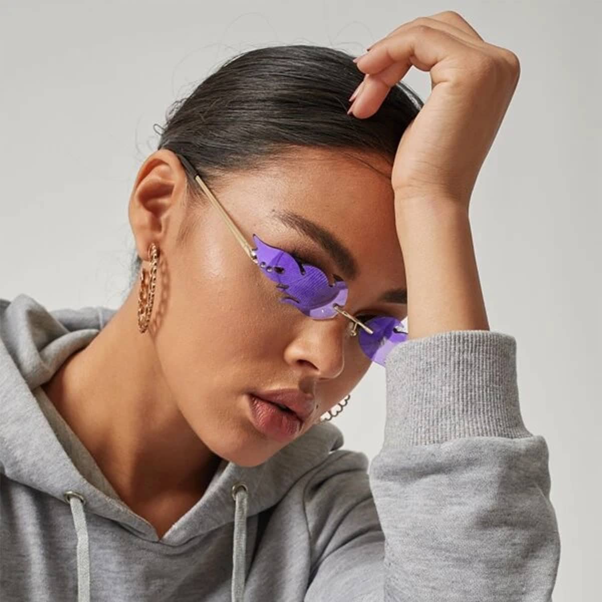 

Flame Shaped Lens Rimless Sunglasses