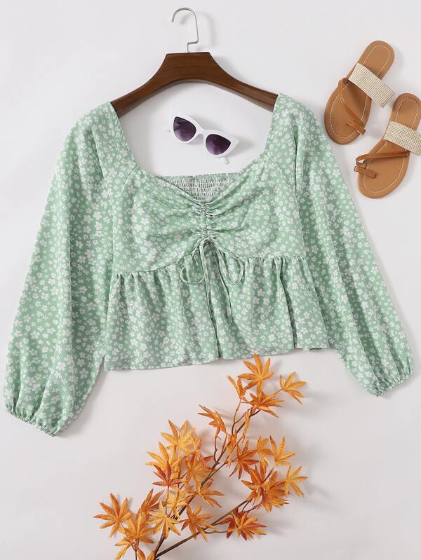 Camisa peplum con cordón delantero floral de margarita Camisa peplum con cordón delantero floral de margarita