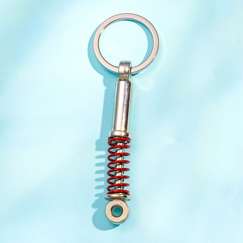 

Guys Shock Absorber Charm Keychain, Silver