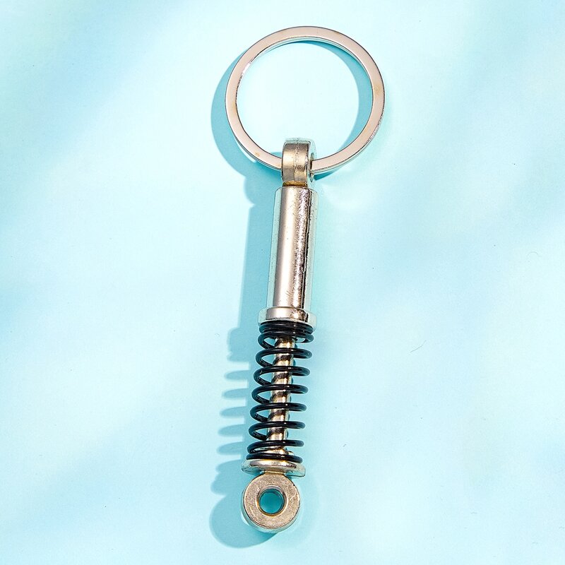 

Guys Shock Absorber Charm Keychain, Silver