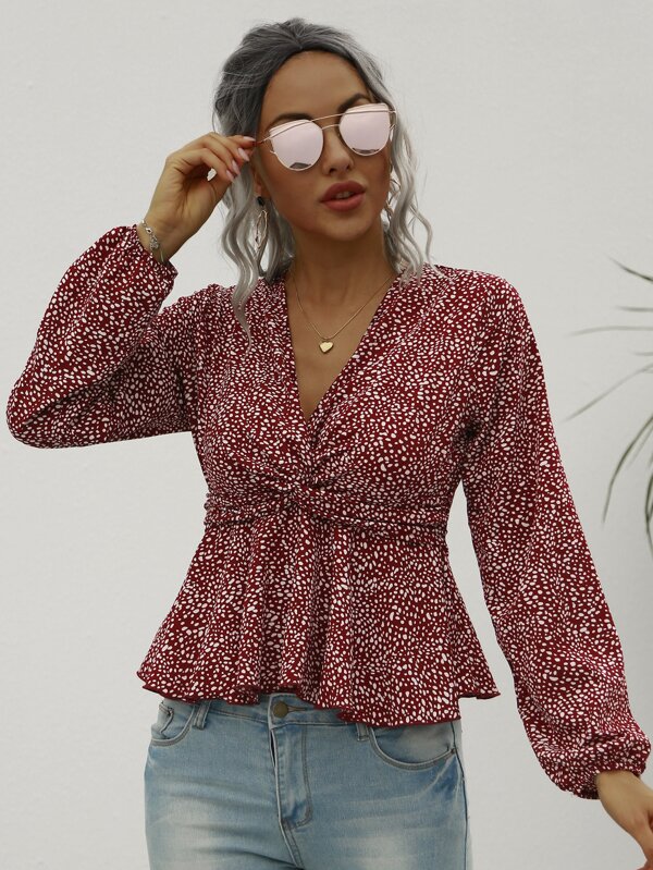 Camisa peplum girante con estampado de lunares | Mode de Camisa peplum de lunares girante delantero | Mode de Mujer
