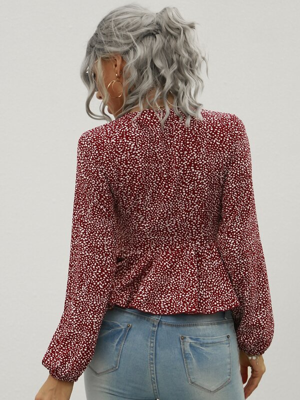Camisa peplum girante con estampado de lunares | Mode de Camisa peplum de lunares girante delantero | Mode de Mujer