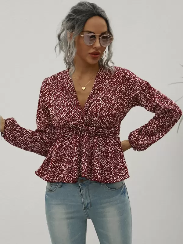 Camisa peplum girante con estampado de lunares | Mode de Camisa peplum de lunares girante delantero | Mode de Mujer