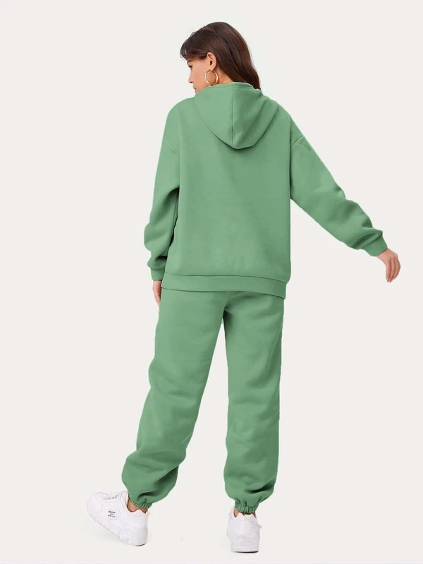 green hoodie and sweatpants