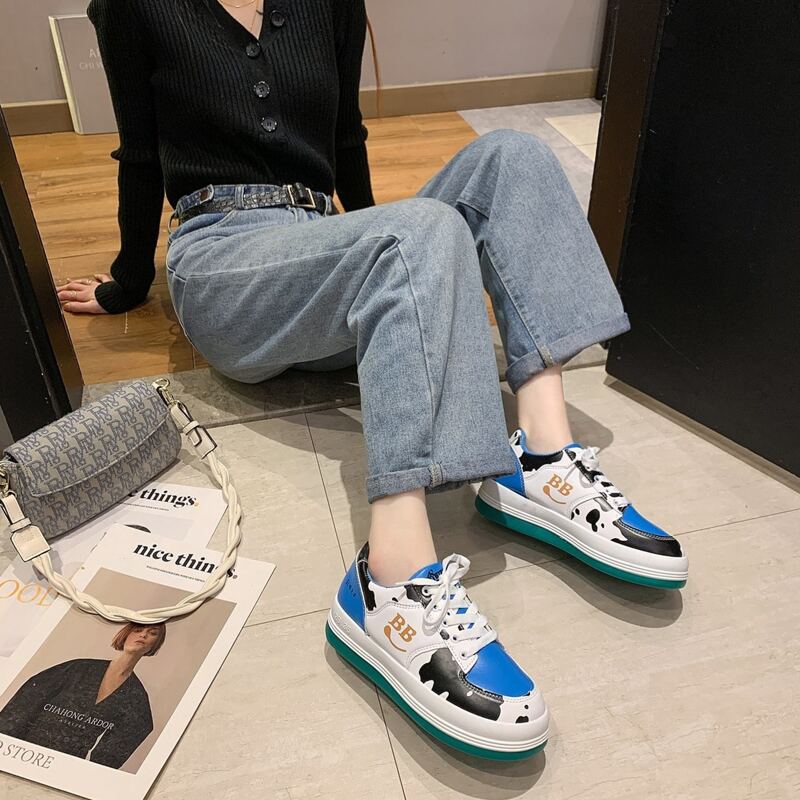 

Cow Print Lace Up Skate Sneakers, Blue