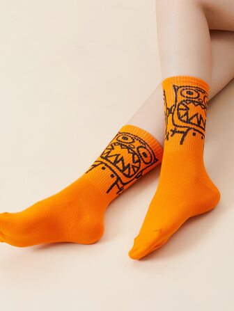 1 paire de chaussettes mode casual mi-mollet à motif diable pour homme