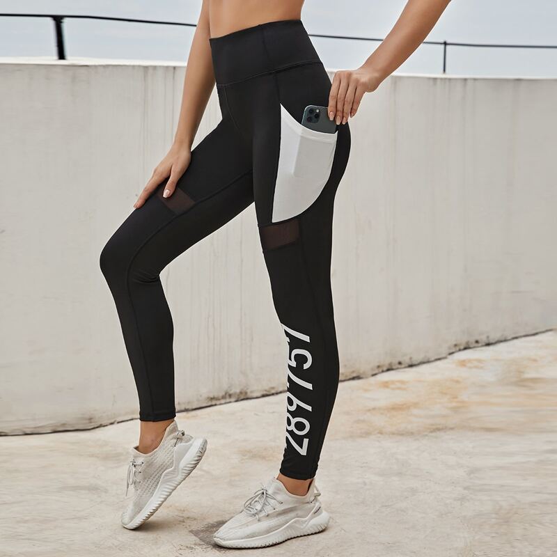 

Letter Graphic Sports Leggings & Phone Pocket, Black and white