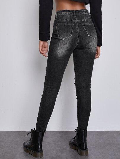 Jean moulant taille haute déchiré