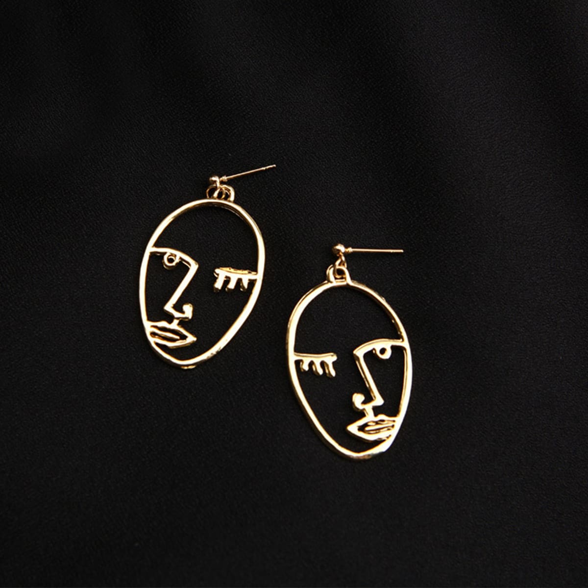 

Abstract Face Drop Earrings, Gold