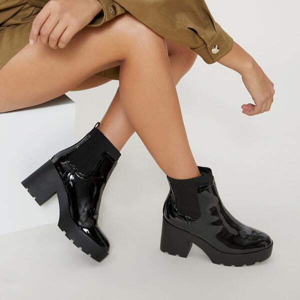 

Vegan Patent Leather Slip On Lug Platform Booties, Black