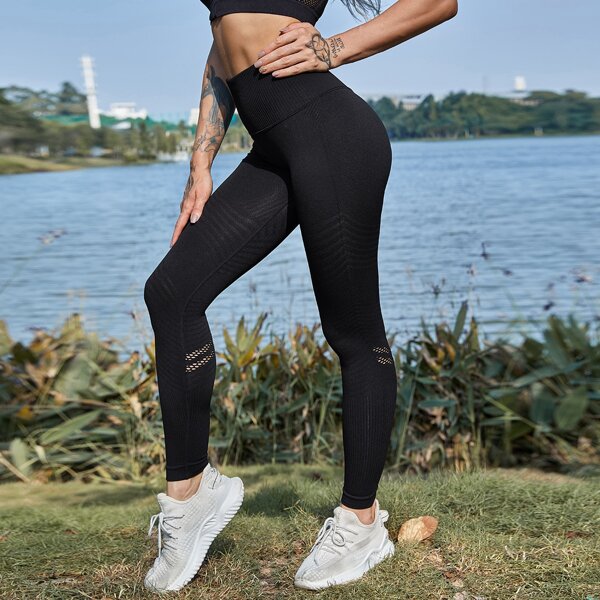 

Solid Laser Cut Sports Leggings, Black