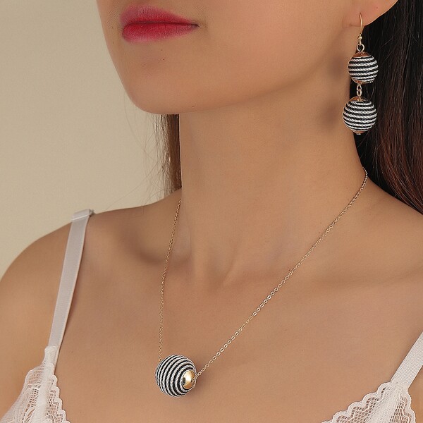

Tribal Geo Charm Necklace & Earrings, Multicolor