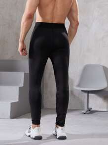 Manfinity Fitness 男士標語圖案瑜伽緊身褲