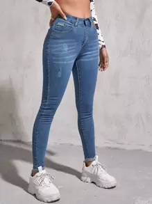 SHEIN Essnce Jeans ajustados con parche de cintura alta