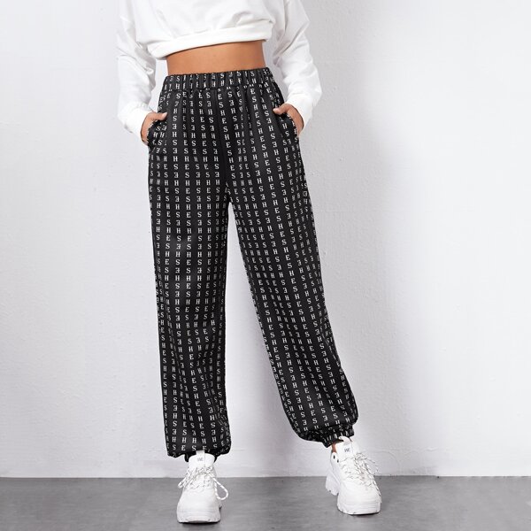 

Pocket Side Allover Letter Graphic Pants, Black