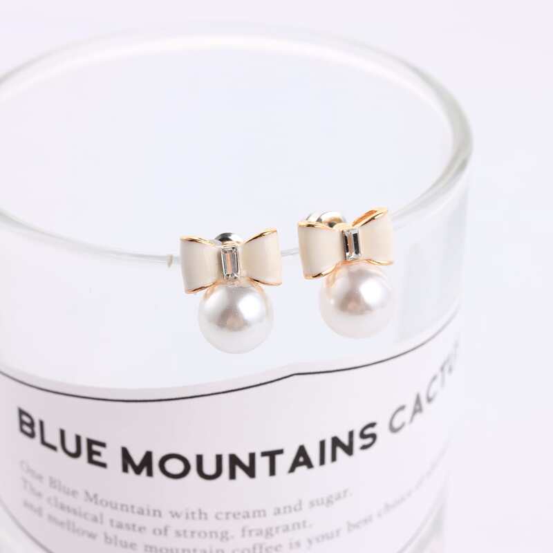 

Faux Pearl & Bow Stud Earrings, White