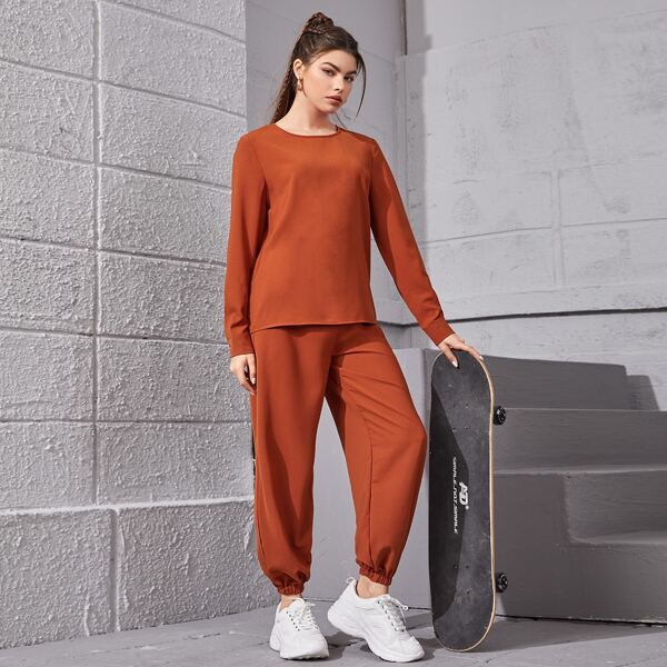 

Solid Round Neck Top & Carrot Pants, Burnt orange