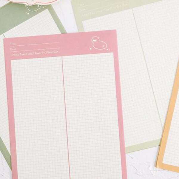 

1pc Cartoon Graphic Random Grid Notebook, Multicolor