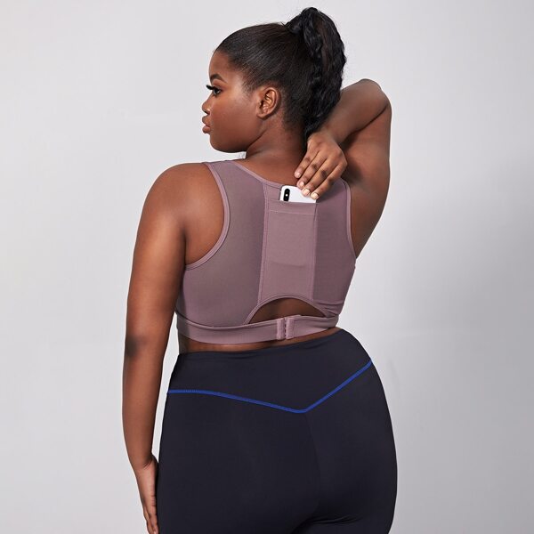 

Plus Solid Cut Out Back Sports Bra With Phone Pocket, Mauve purple