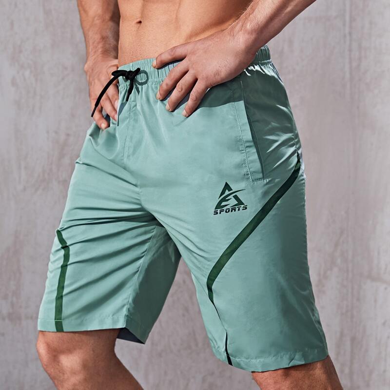 

Men Letter Graphic Drawstring Waist Sports Shorts, Mint green