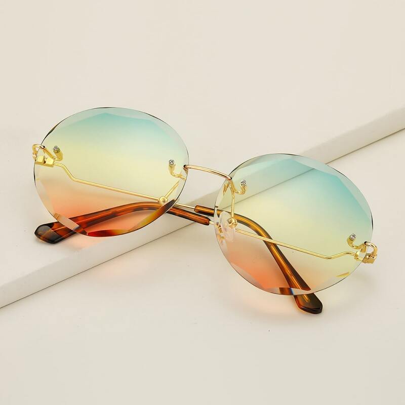 

Round Frame Rimless Sunglasses