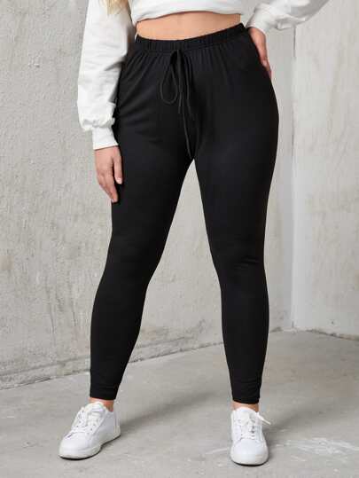 طماق مقاس كبير بلون موحد معقود امامي