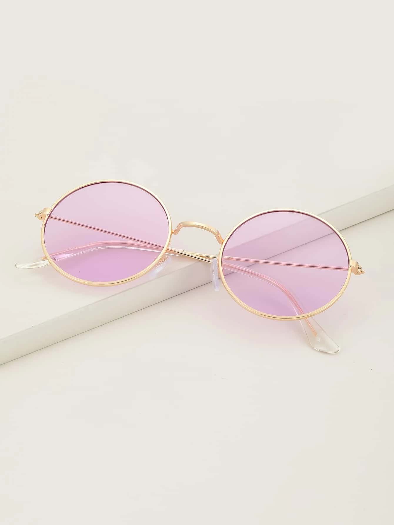 È questo il nuovo Occhiali alla moda tondi con lenti tinteggiate