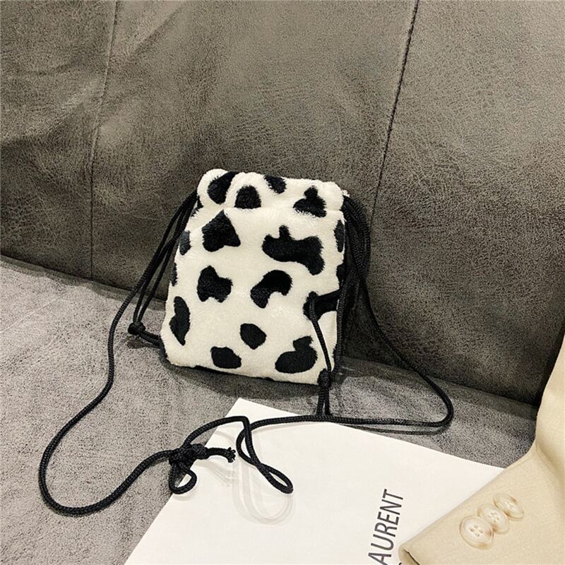 

Cow Print Drawstring Fluffy Crossbody Bag, Black and white