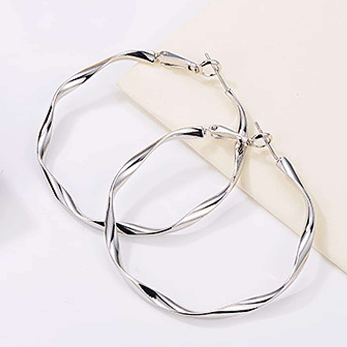 

Twist Hoop Earrings, Silver