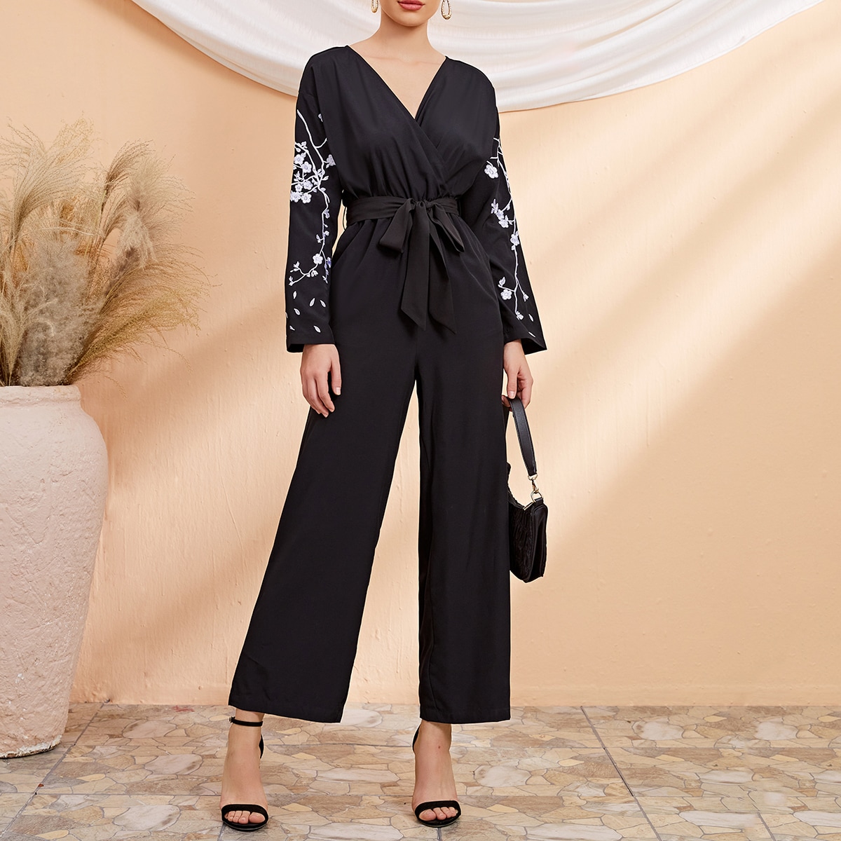 Image of Floral Embroidery Surplice Front Belted Jumpsuit