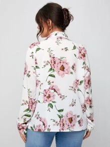 Top con stampa floreale con nodo al collo