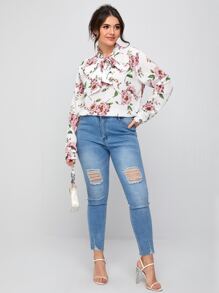 Top con stampa floreale con nodo al collo