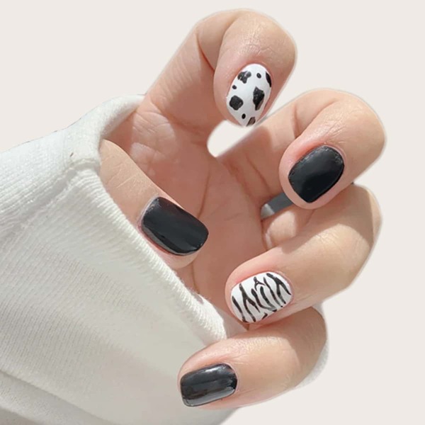 

24pcs Cow Pattern Fake Nail & 1sheet Tape, Black and white