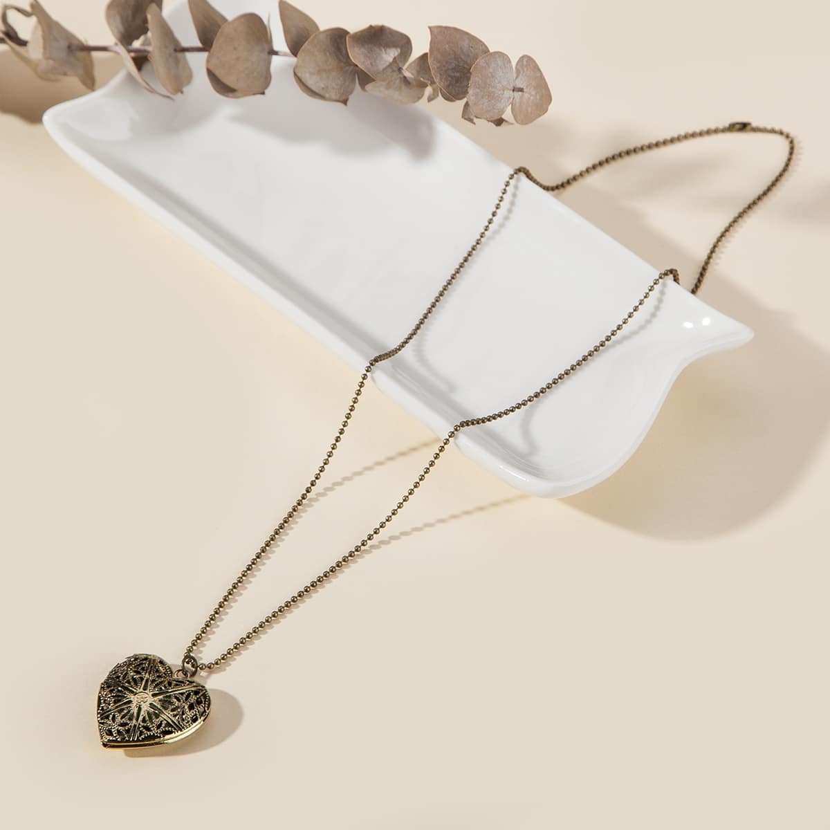 

Luminous Hollow Heart Pendant Necklace, Bronze