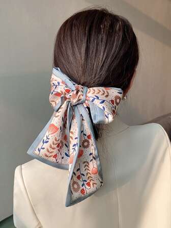 ربطة شعر بطباعة زهر أقحواني