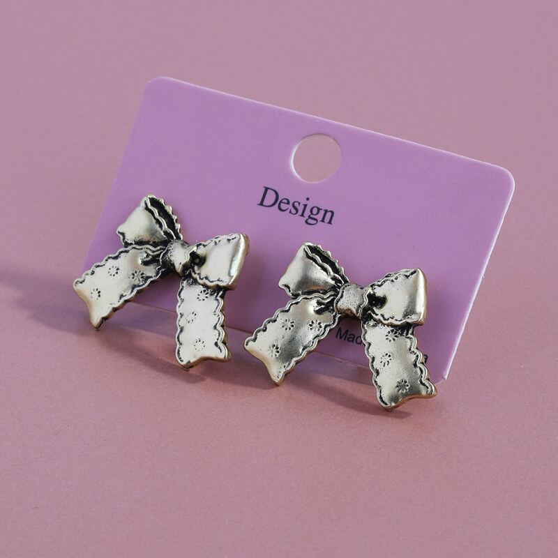 

Metal Bow Stud Earrings, Antique silver