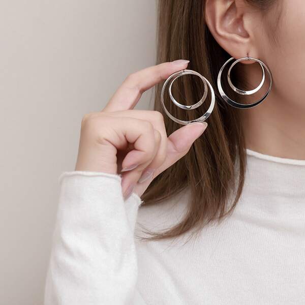

Gold Round Design Earrings, Silver