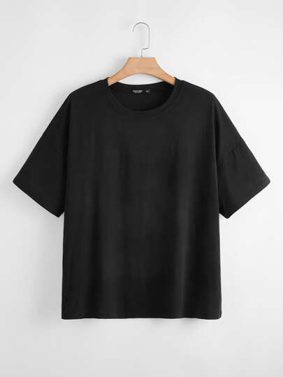 تي شيرت منخفض الاكتاف بعنق مدور وبلون موحد مقاس كبير