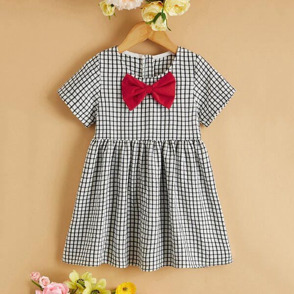 

Toddler Girls Bow Front Plaid Smock Dress, Black and white