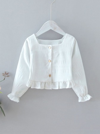 بلوزة بازرار وبحافة مكشكشة بلون موحد للبنات الصغار