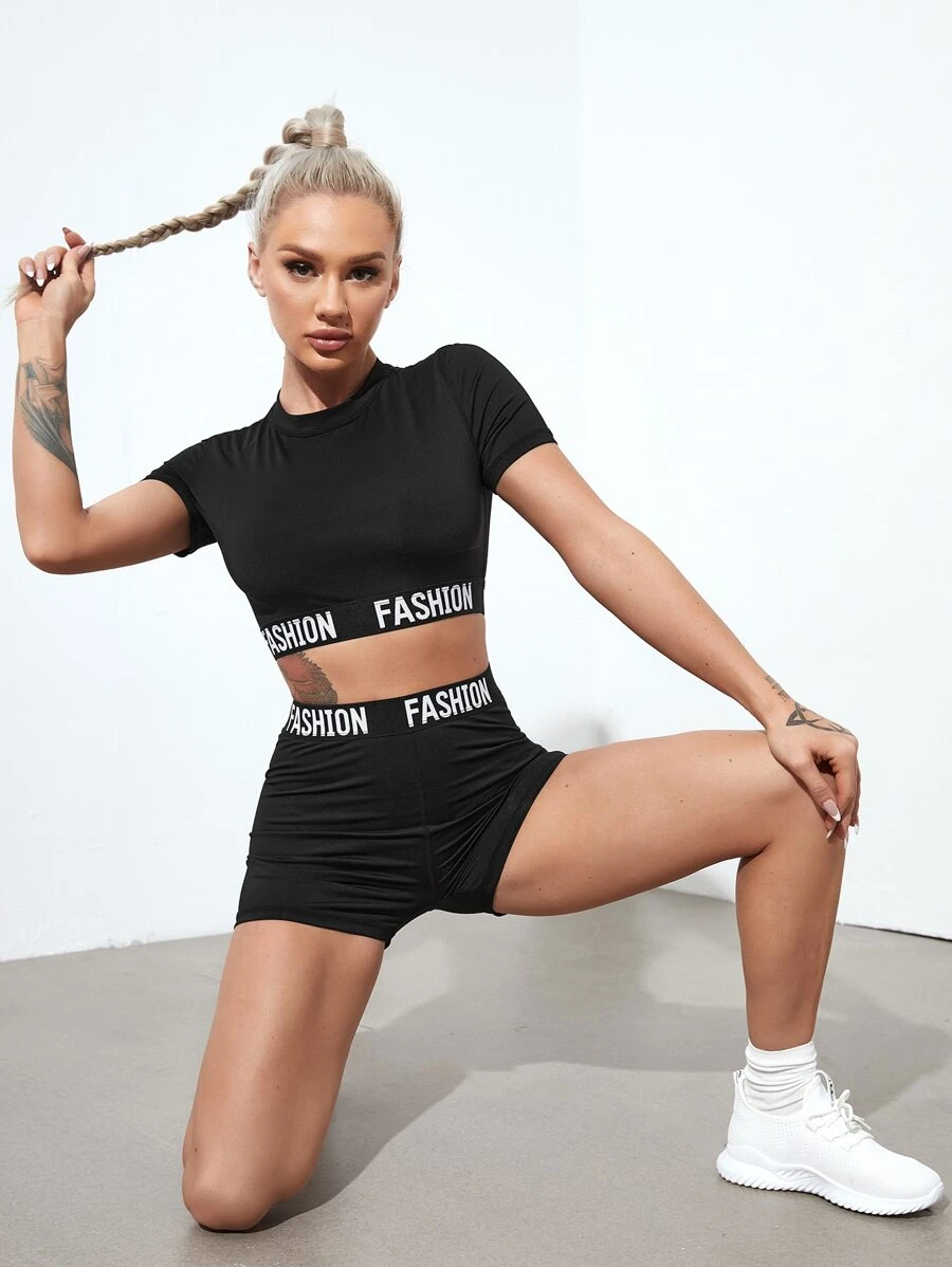 Easithlete 2 bộ tập chạy bộ băng chữ cái áo crop top & quần đùi Biker - màu đen - Xem 1