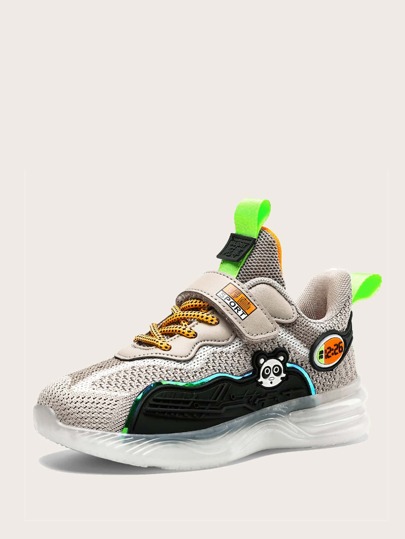 حذاء رياضي محبوك بجرافيك عبارة صيني للاولاد
